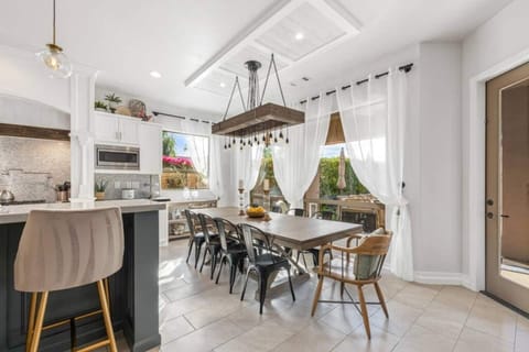 Dining Area with Seating for 10.
Set the mood right with our one of a kind custom chandelier and create ambience of soothing lights and experience a sparkling Dining moment to last.