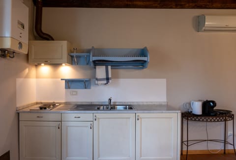 Mini-fridge, microwave, stovetop, espresso maker