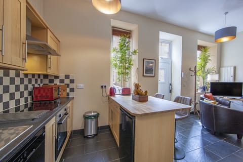 Grand Suite | Private kitchen | Mini-fridge, dining tables