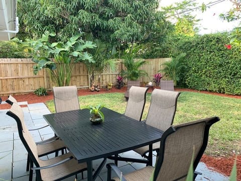 Relax in the private back yard. Enjoy the new grill or order in! I know I have to put up a new picture, the New white vinyl privacy fence, landscaping and New Hot Tub Spa take up the corner of the back yard. You will love it!