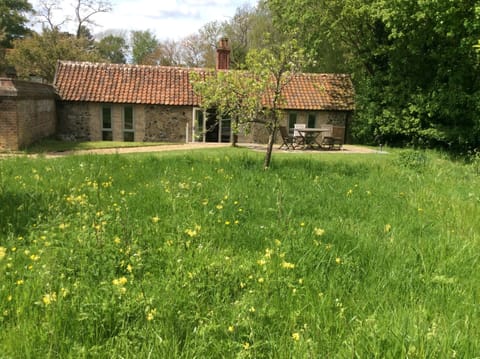 Orchard cottage in the spring.