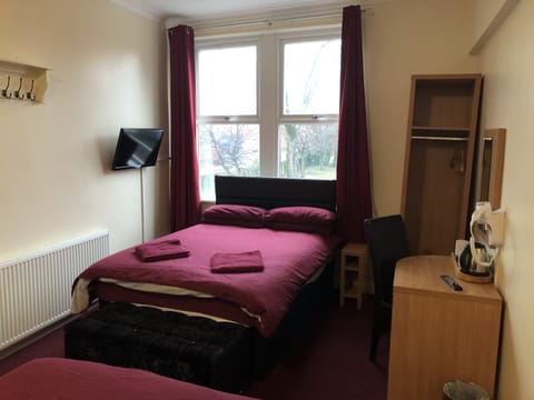 Family Room, Multiple Beds | Desk, free WiFi, bed sheets