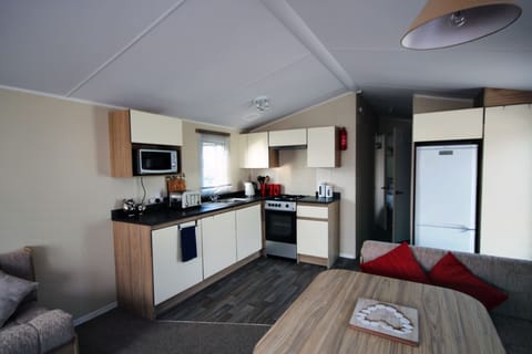 A well equipped kitchen to prepare your meals  in