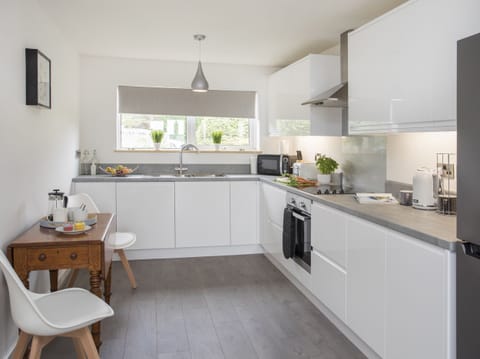 Cottage | Private kitchen | Highchair, cookware/dishes/utensils