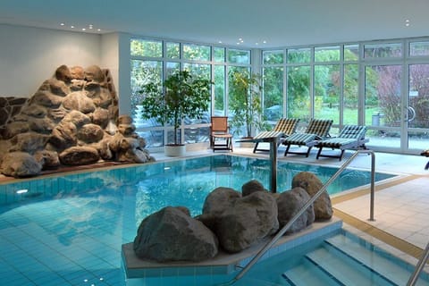 Indoor pool, open 6:30 AM to 8:00 PM, sun loungers