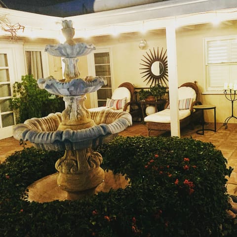 Just outside your door,  lounge chairs under covered patio.