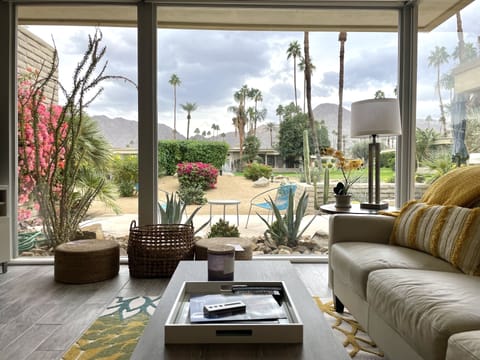 View from living room and dining room. Nice year round. Blinds can go down