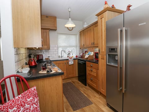 Microwave, stovetop, dishwasher, cookware/dishes/utensils