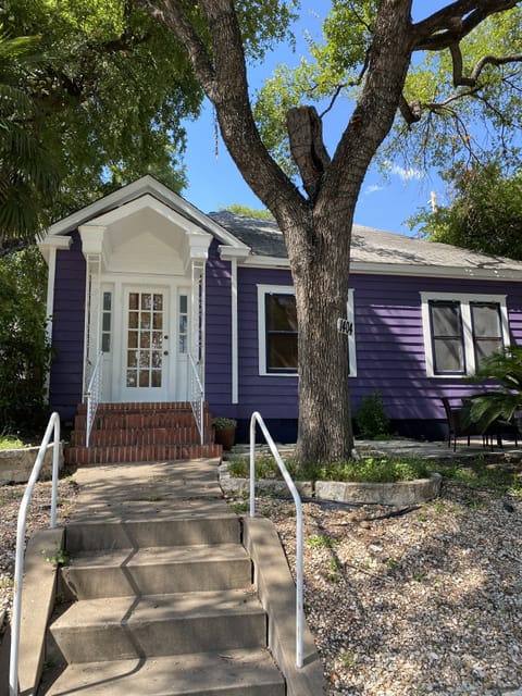 Adorable purple bungalow right on W. 6th Street!