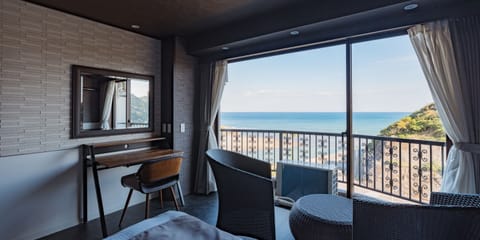 Deluxe Twin Room, Non Smoking, Sea View | Desk, laptop workspace, iron/ironing board (on request), WiFi (free)
