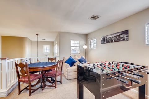 Game room.  Chair has a pull out twin bed.  