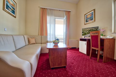 Suite, Balcony, Sea View | In-room safe, desk, free WiFi, bed sheets