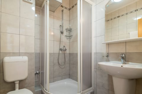 Shower, free toiletries, hair dryer, towels