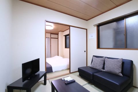 Apartment, 1 Bedroom (I201) | Living room | TV