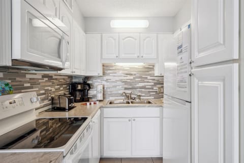 Condo, 1 King Bed (The Summit 1017) | Private kitchen | Fridge