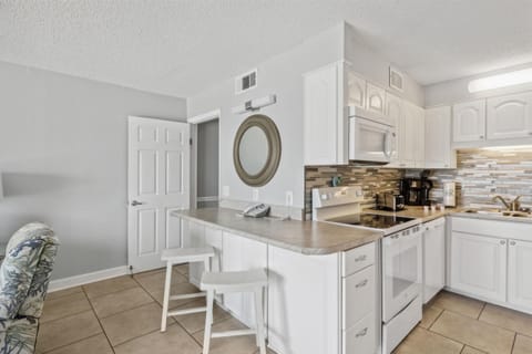 Condo, 1 King Bed (The Summit 1017) | Private kitchen | Fridge