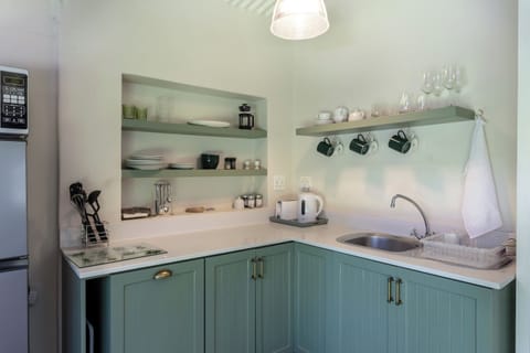 Self-Catering Suite | Private kitchen | Microwave, coffee/tea maker, electric kettle