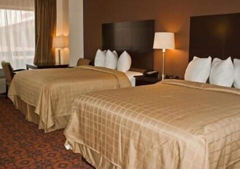 Desk, laptop workspace, blackout drapes, iron/ironing board