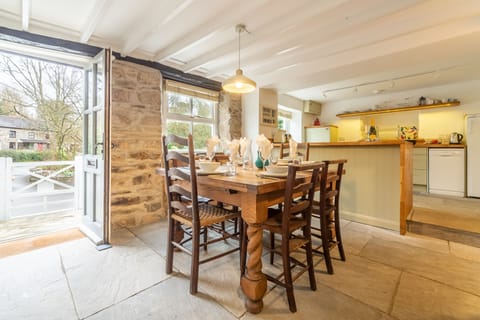 Ground floor: Dining area with table and seating