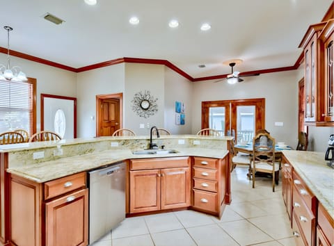 1st Floor - 🍽️ Gourmet kitchen with bar seating and stainless steel appliances