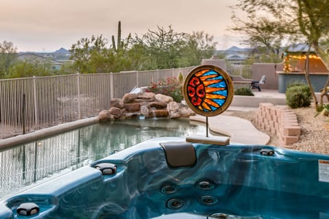The 56 jet hot tub features great sunset and desert views