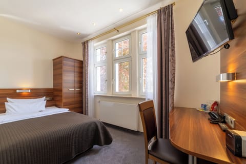 Comfort Einzelzimmer | Hypo-allergenic bedding, minibar, in-room safe, desk