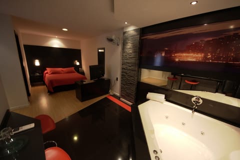 Luxury Room, Jetted Tub (Only adults) | Pillowtop beds, minibar, in-room safe, laptop workspace