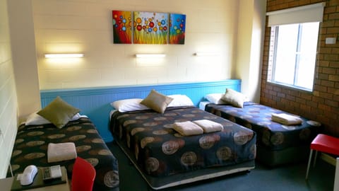 Family Room | Desk, blackout drapes, iron/ironing board (on request), WiFi (free)