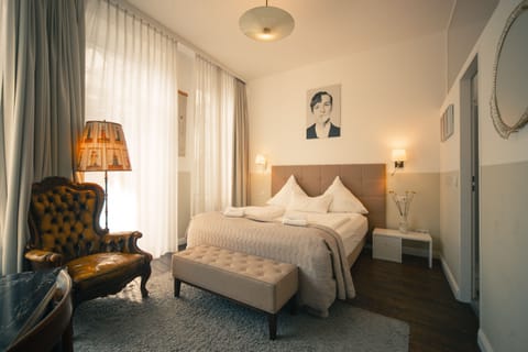 Deluxe Double Room | Minibar, blackout drapes, iron/ironing board, free WiFi