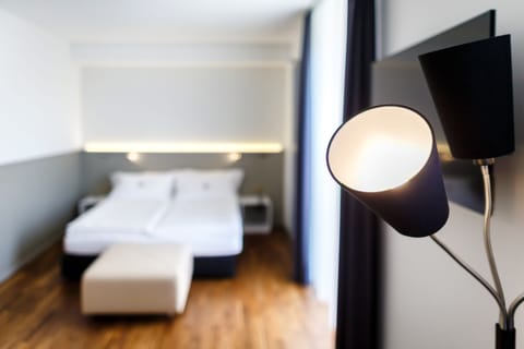 Deluxe Double Room | Minibar, desk, blackout drapes, iron/ironing board