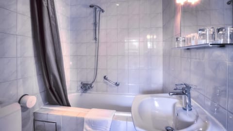 Standard Triple Room | Bathroom | Combined shower/tub, deep soaking tub, rainfall showerhead