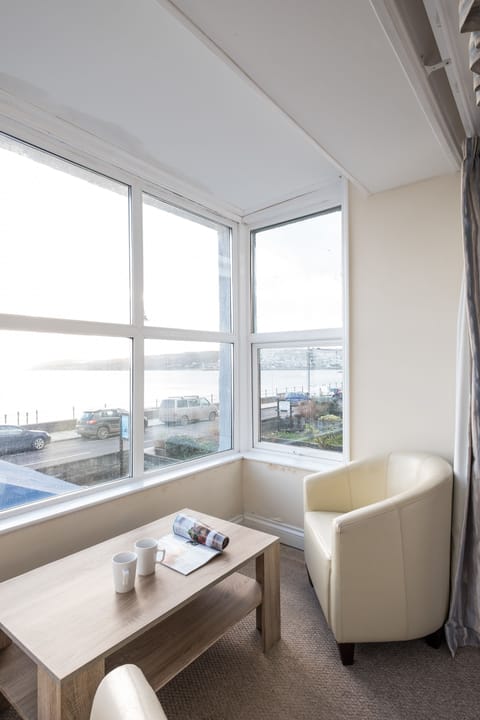 Double Room, Sea View (Room 23) | Living area | Flat-screen TV