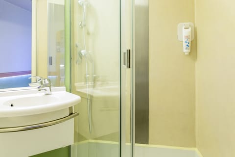 Shower, eco-friendly toiletries, hair dryer, towels