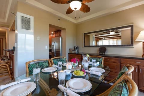 Dining room table for 8 and direct access to the wrap-around lanai.