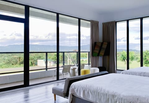 Panoramic Quadruple Room, Multiple Beds, Balcony, Mountain View | Premium bedding, down comforters, free minibar, individually decorated