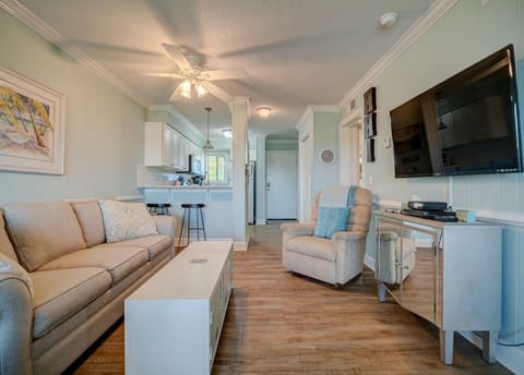 Family Room looking toward kitchen, entrance and breakfast bar