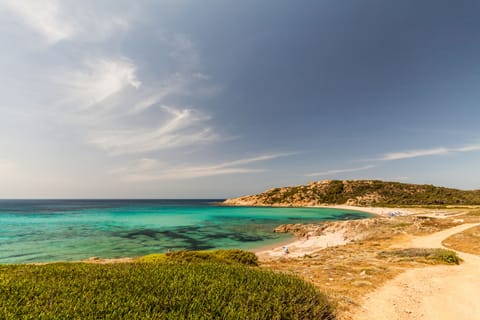 Beach nearby, white sand, beach towels, 4 beach bars