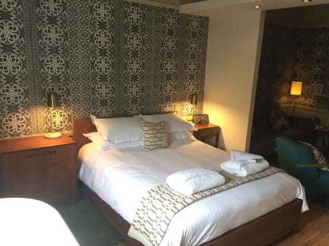 Suite | Premium bedding, down comforters, individually decorated