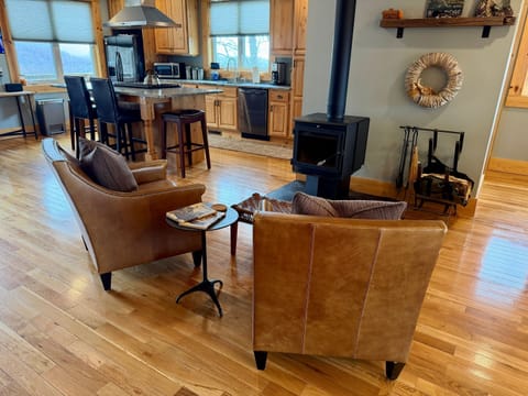 Wood burning stove seating area in Living Room