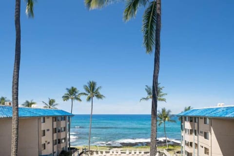 Enjoy this gorgeous view from the lanai, the cozy couch and kitchen too!