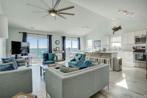 Top floor living and kitchen with ocean front deck. Gorgeous, airy, updated!
