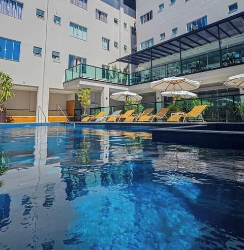 Outdoor pool, open 10:00 AM to 10:00 PM, sun loungers