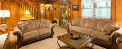 Relax and enjoy a piece of Western NC history at White Squirrel Log Cabin.