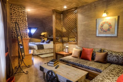 Executive Suite, Fireplace, Mountain View | Living area | TV