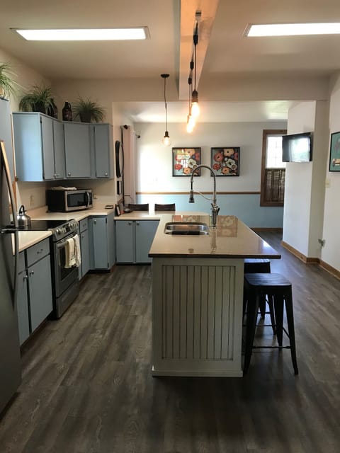 The open concept kitchen/family room allow everyone to be part of the convo!