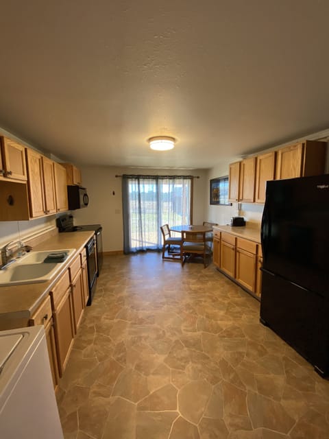 Full kitchen located downstairs 