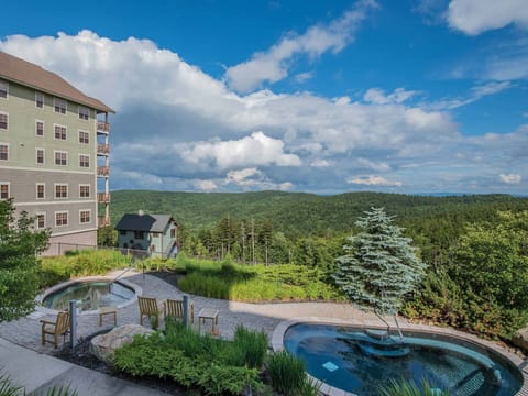 Enjoy the heated outdoor hot tubs and fire pit.