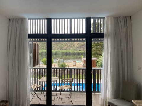 Double or Twin Room, Balcony, River View | Minibar, soundproofing, free cribs/infant beds, rollaway beds