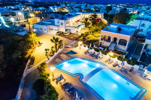 Seasonal outdoor pool, open 9:00 AM to 8:00 PM, pool umbrellas