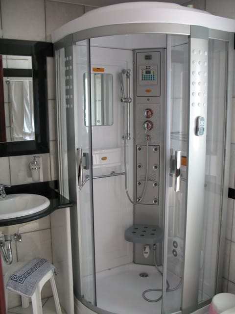 Shower, free toiletries, hair dryer, towels